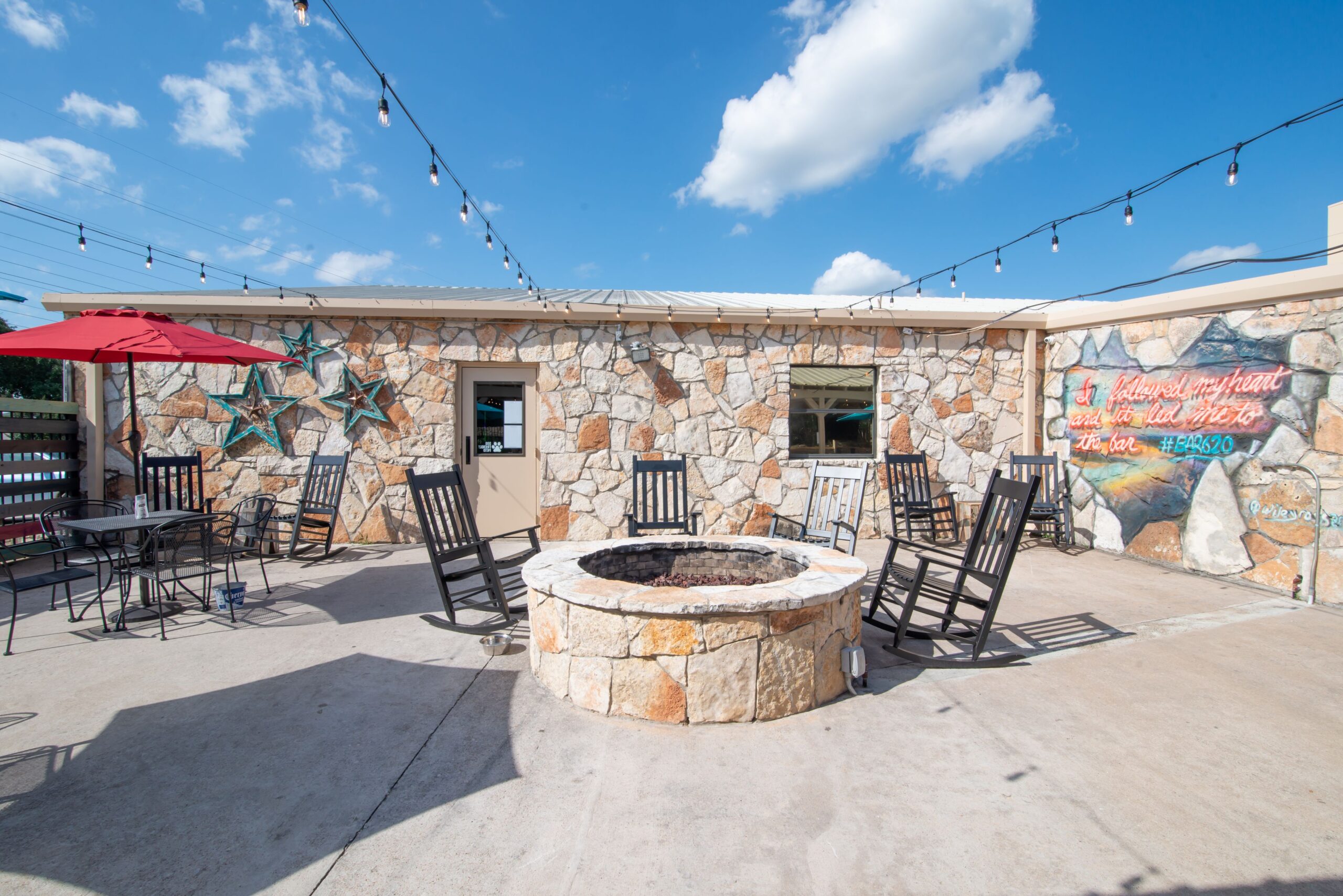 Outdoor seating at a restaurant with firepit