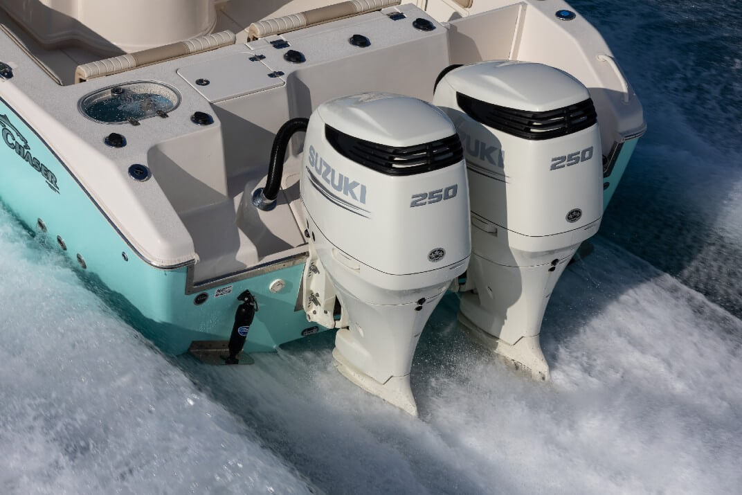 Powerful Suzuki Motors Powering boat in the water