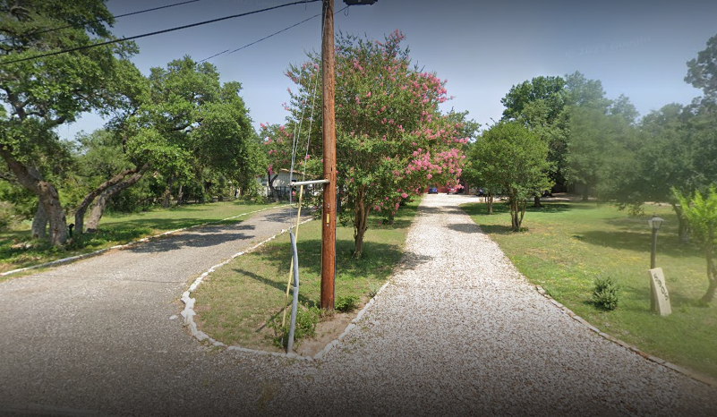 Two gravel driveways next to eachother