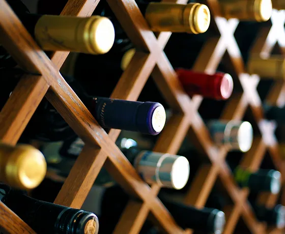 Wine bottles stored on a rack