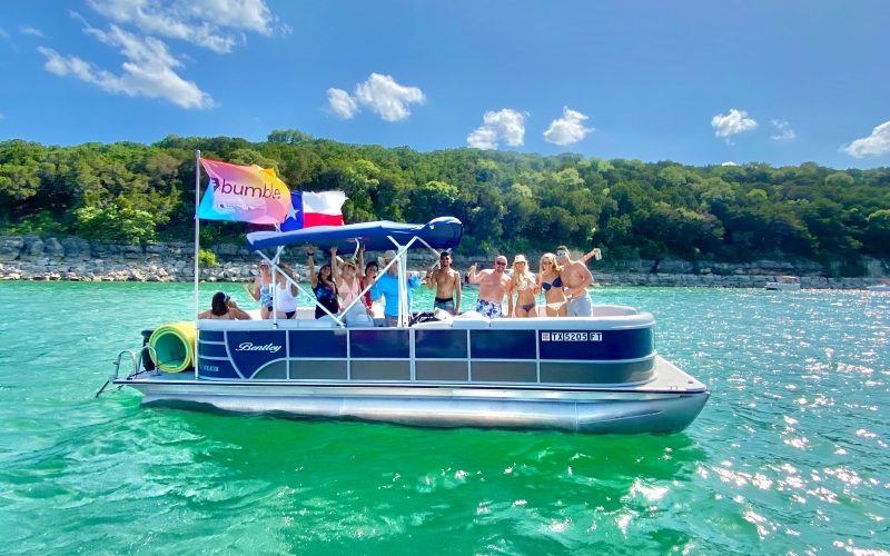 Friends on rental boat on Lake Travis, Texas