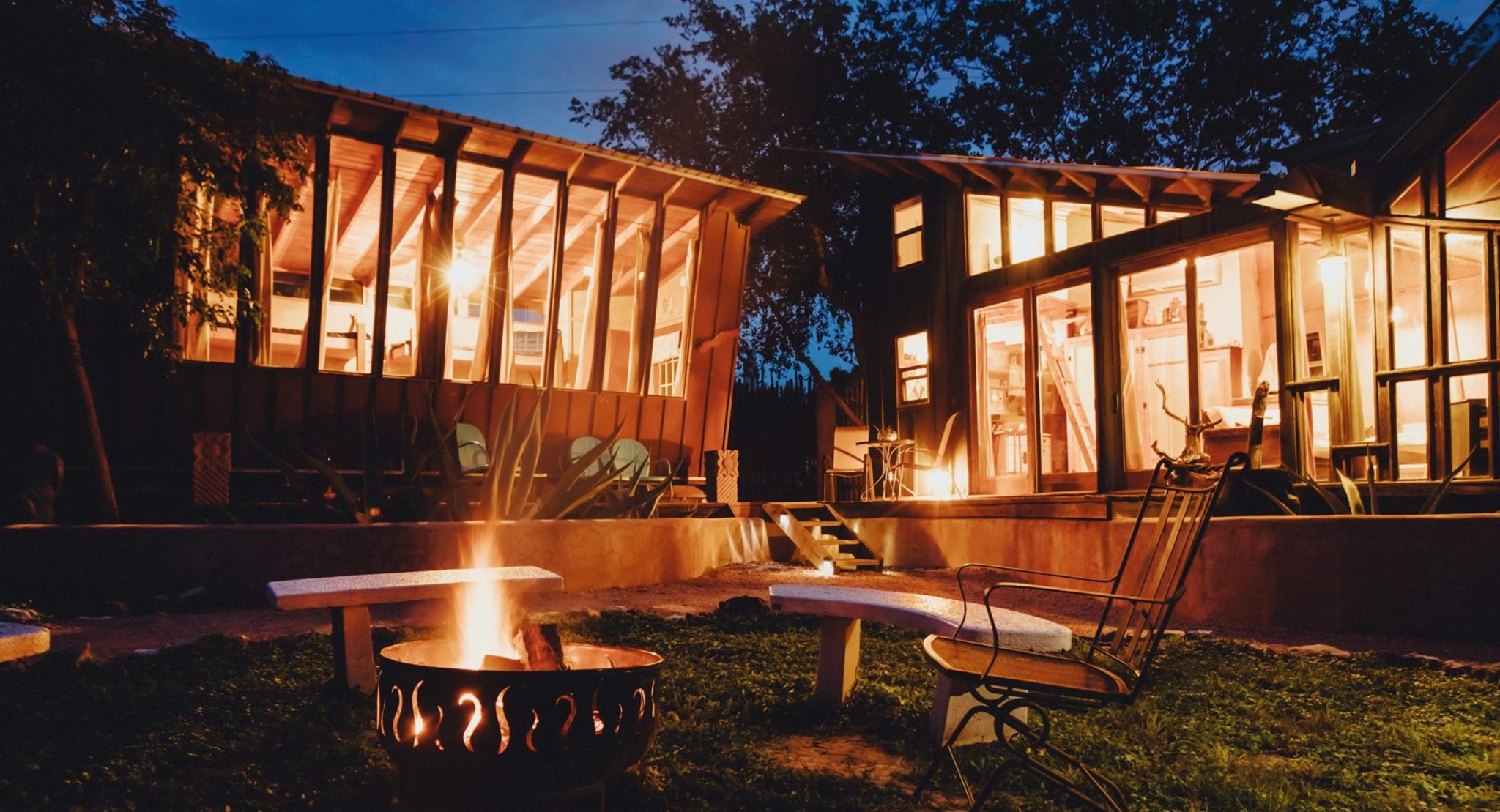 Cozy Cabins lit up in the evening