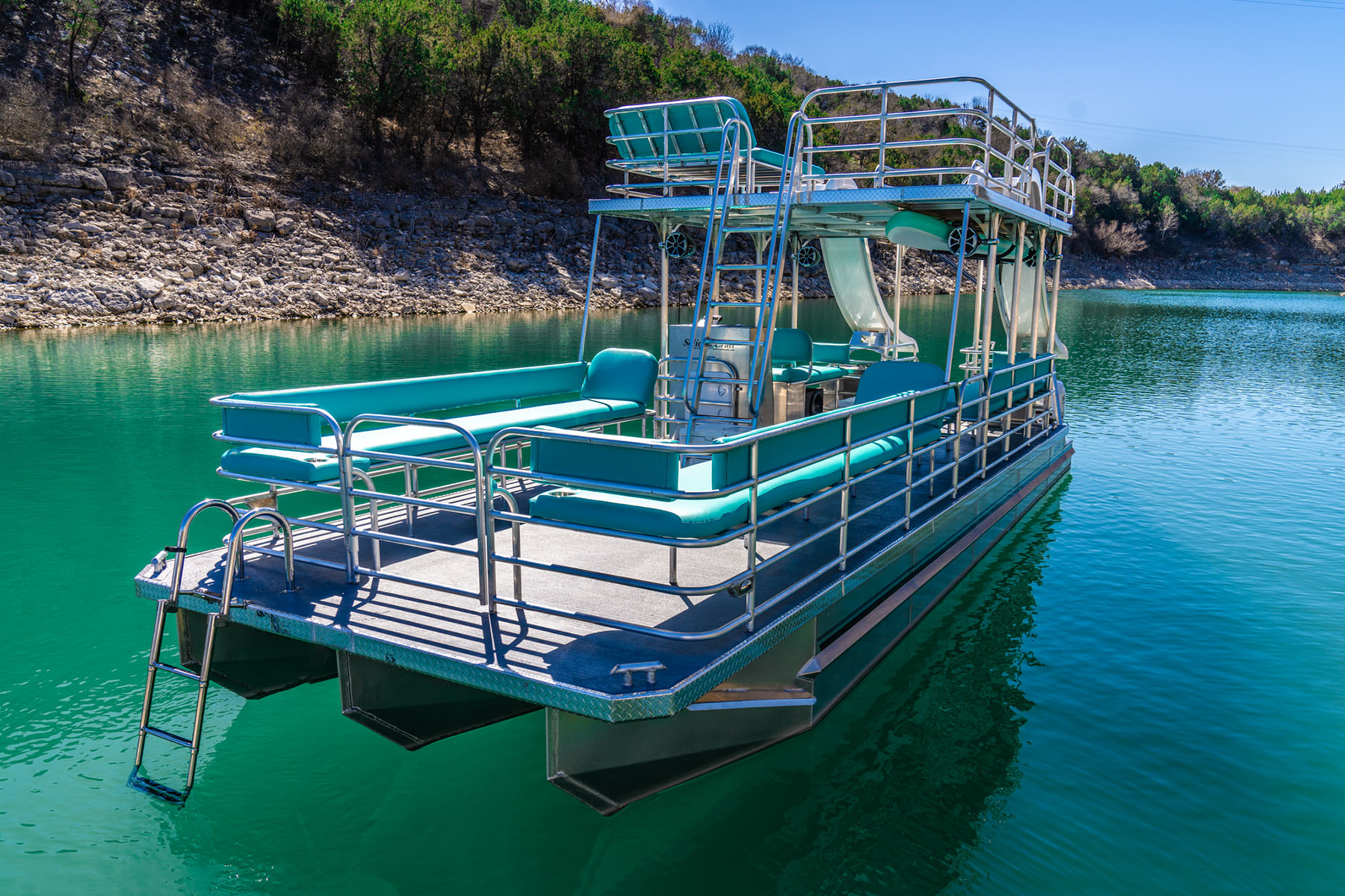 Blue pontoon on Lake Travis, Texas