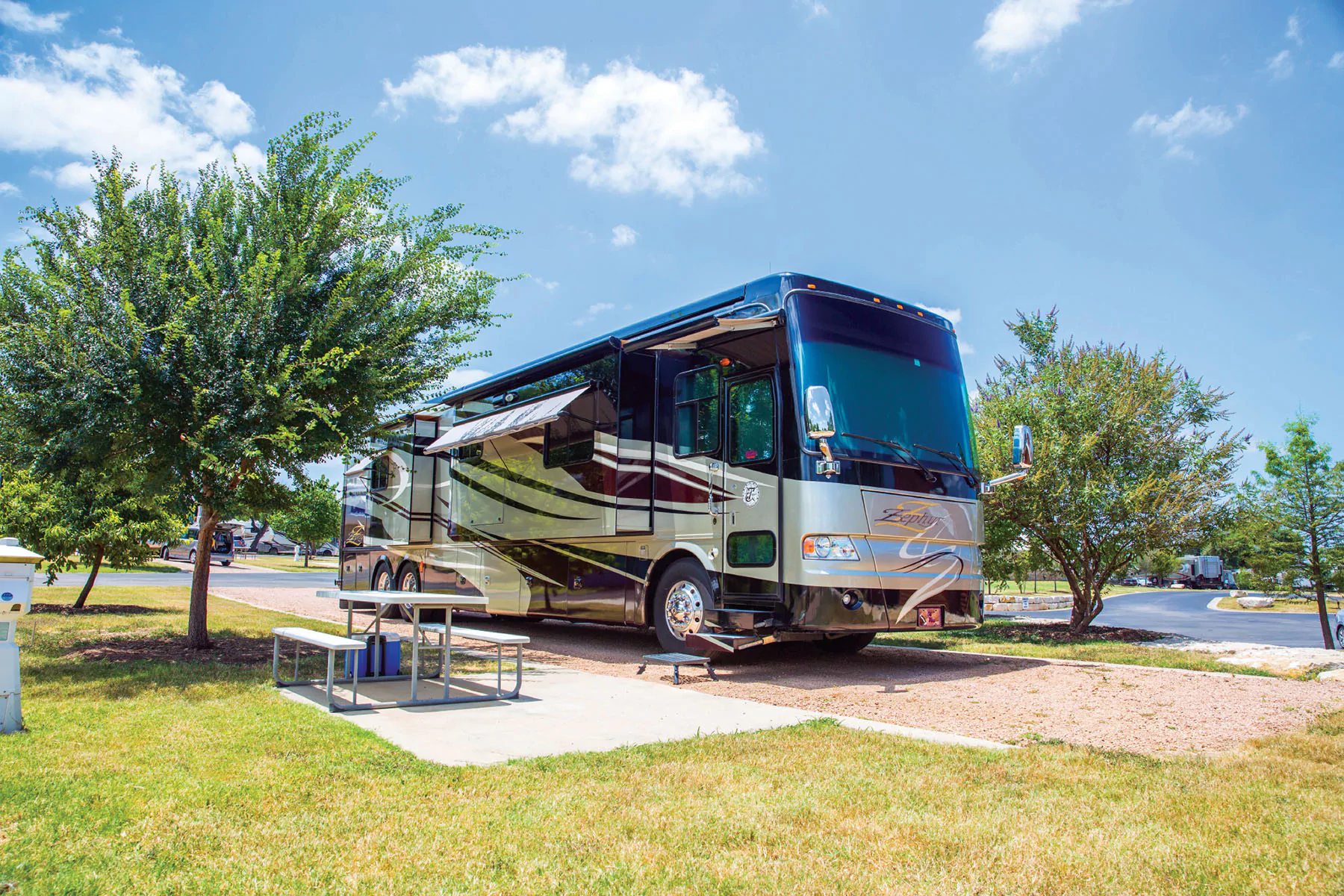 Large RV parked at a campsite