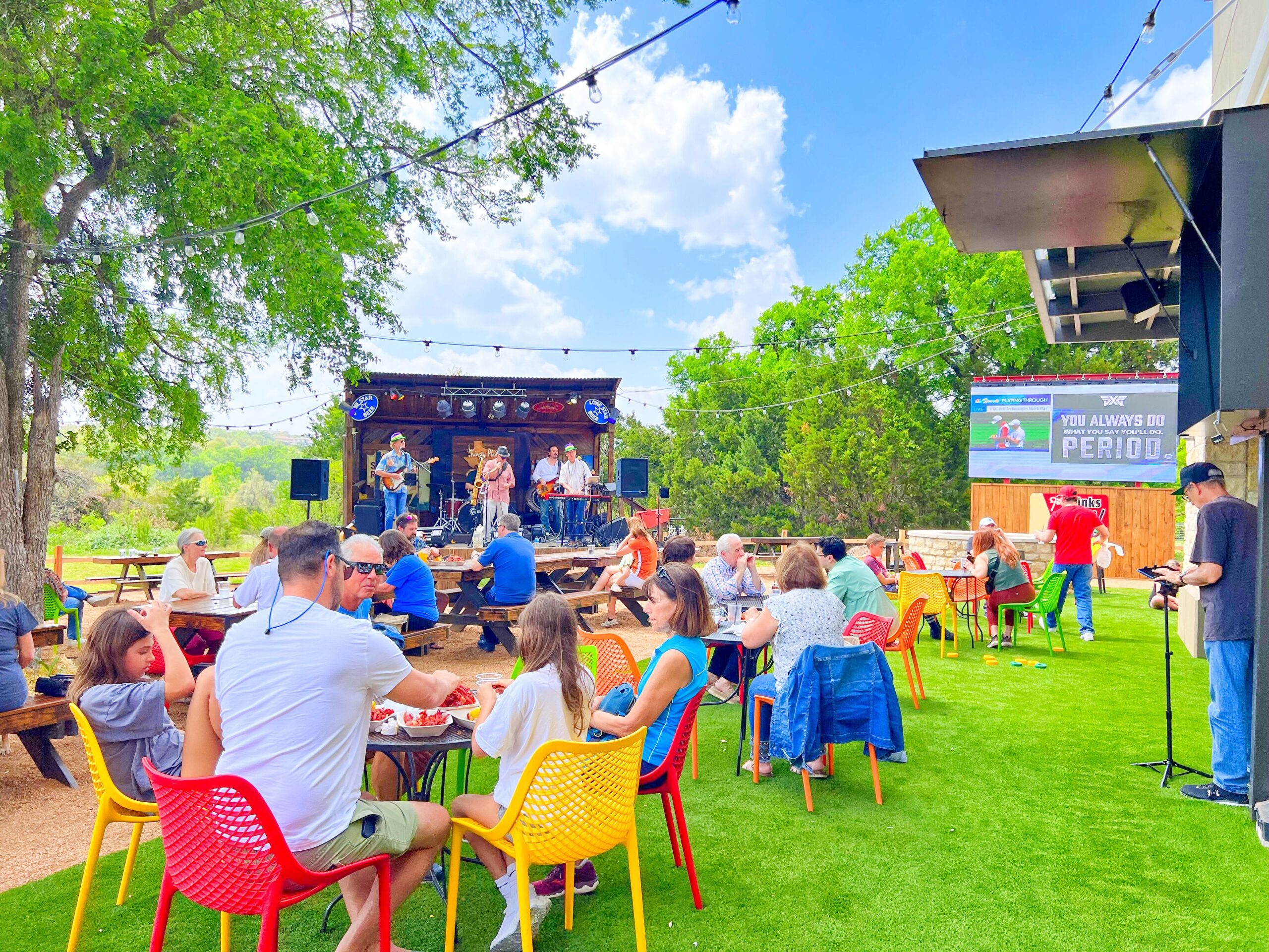 People enjoying music at Woody's Tavern and Grill