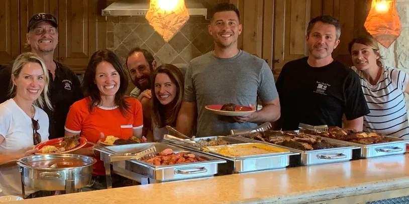 Family enjoying a catered meal