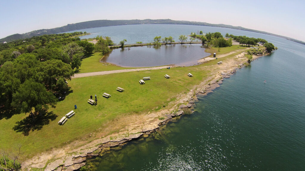 Shoreline picnic at Windy Point Park Lake Travis, Texas